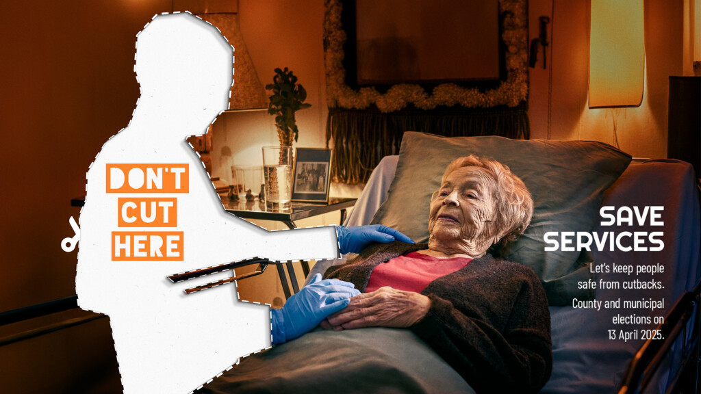 An elderly person lies on a bed. A human-shaped figure that looks like a cut out paper doll stands beside the bed. Words “Don’t cut here” are printed on the figure. Text in the lower right corner reads: “Save services. Let’s keep people safe from cutbacks. County and municipal elections on 13 April 2025.”